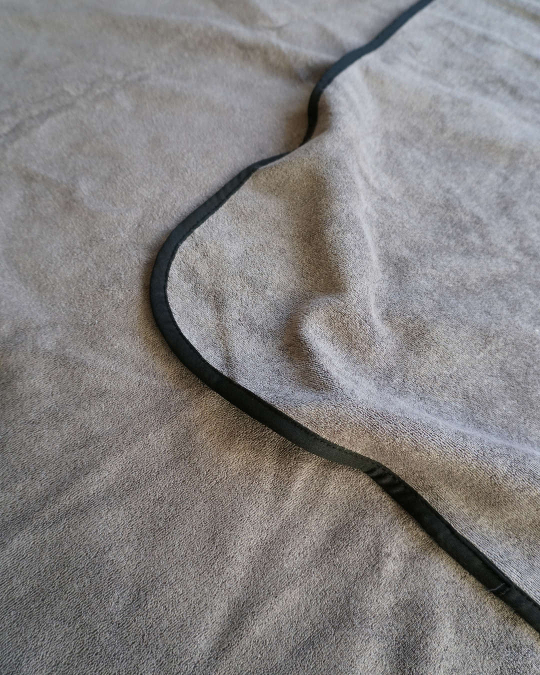 Folded Split Peach Afterplay Rug – sleek, slim, and compact cooling blanket made from bamboo