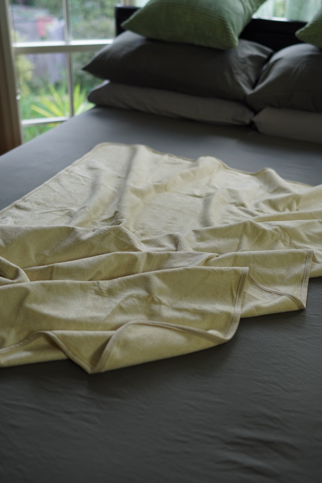 Sand Regular blanket showing soft drape and edging
